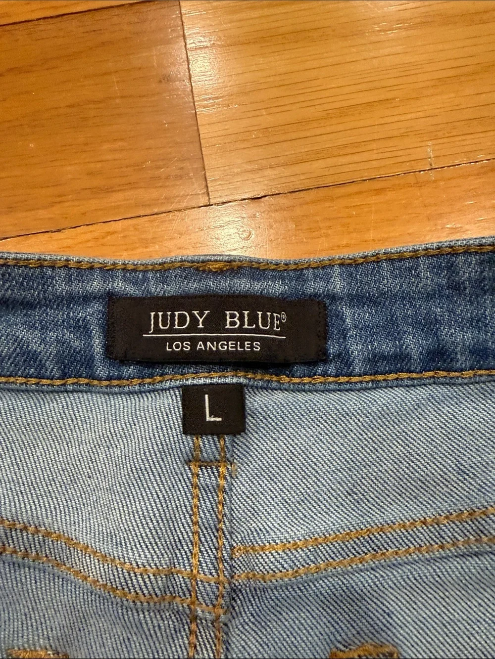 Judy Blue high waisted mild distressed raw hem jeans shorts size large .